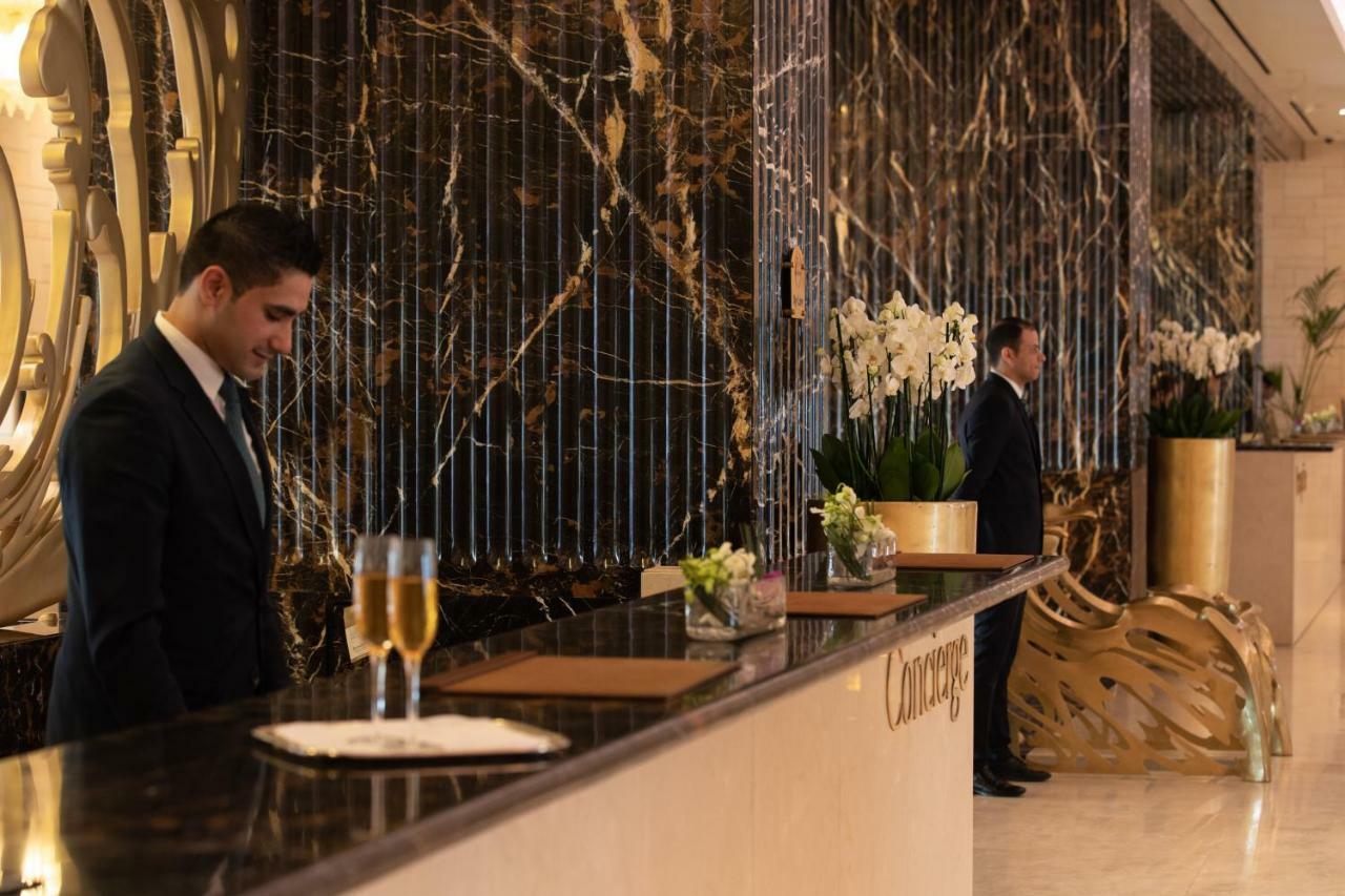 Jumeirah Messilah Beach Kuwait 쿠웨이트 외부 사진 Concierge at the Four Seasons Hotel, London